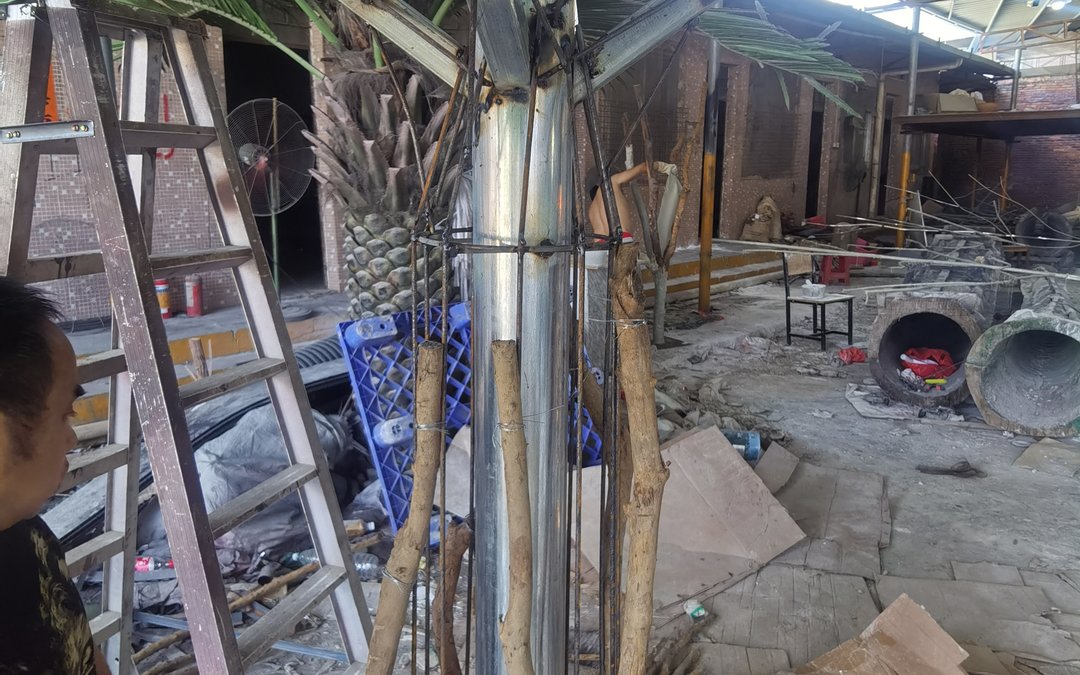 The galvanized steel core and welded branch arms of a large specimen during assembly