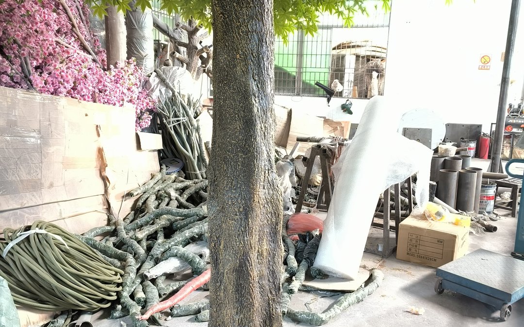 Coiled replacement branches and packed cartons in the assembly area