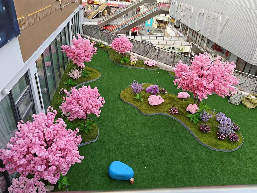 Artificial cherry blossom garden on a shopping mall rooftop in Bangkok, Thailand